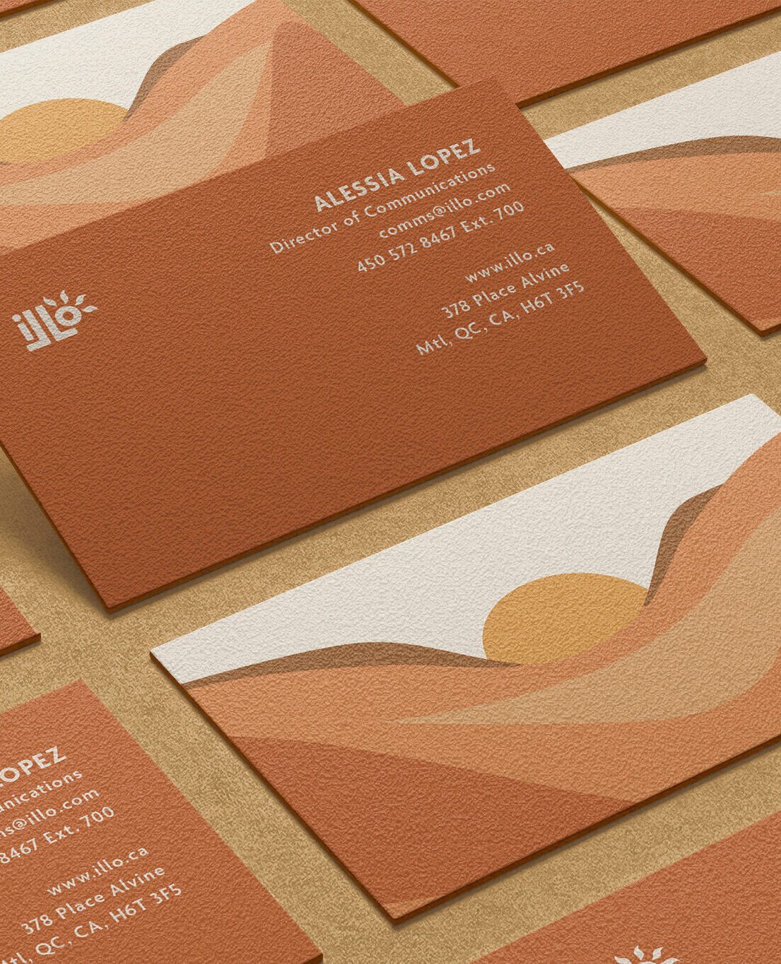Business cards created for an imagined travel agency called illo adventures. These are the desert themed orange ones with an illustrated landscape of the desert on the back.