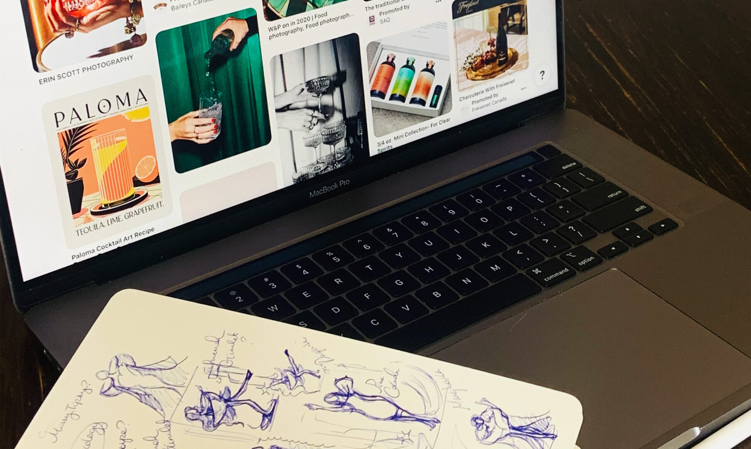 web thumbnail for Skye's Graphic Design Eportfolio. It is a landscape image of computer alongside a sketchbook.