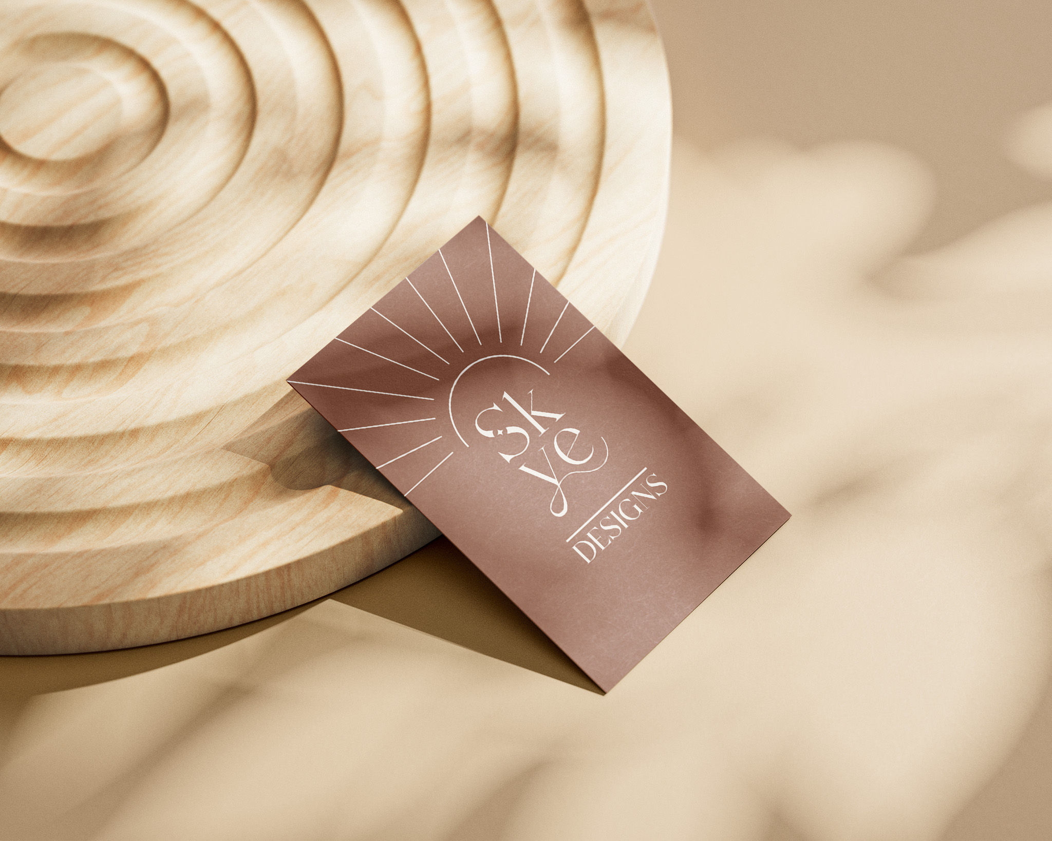 This is my old business card design. It features a cream and burgundy colour palette with a subdued and natural mood.