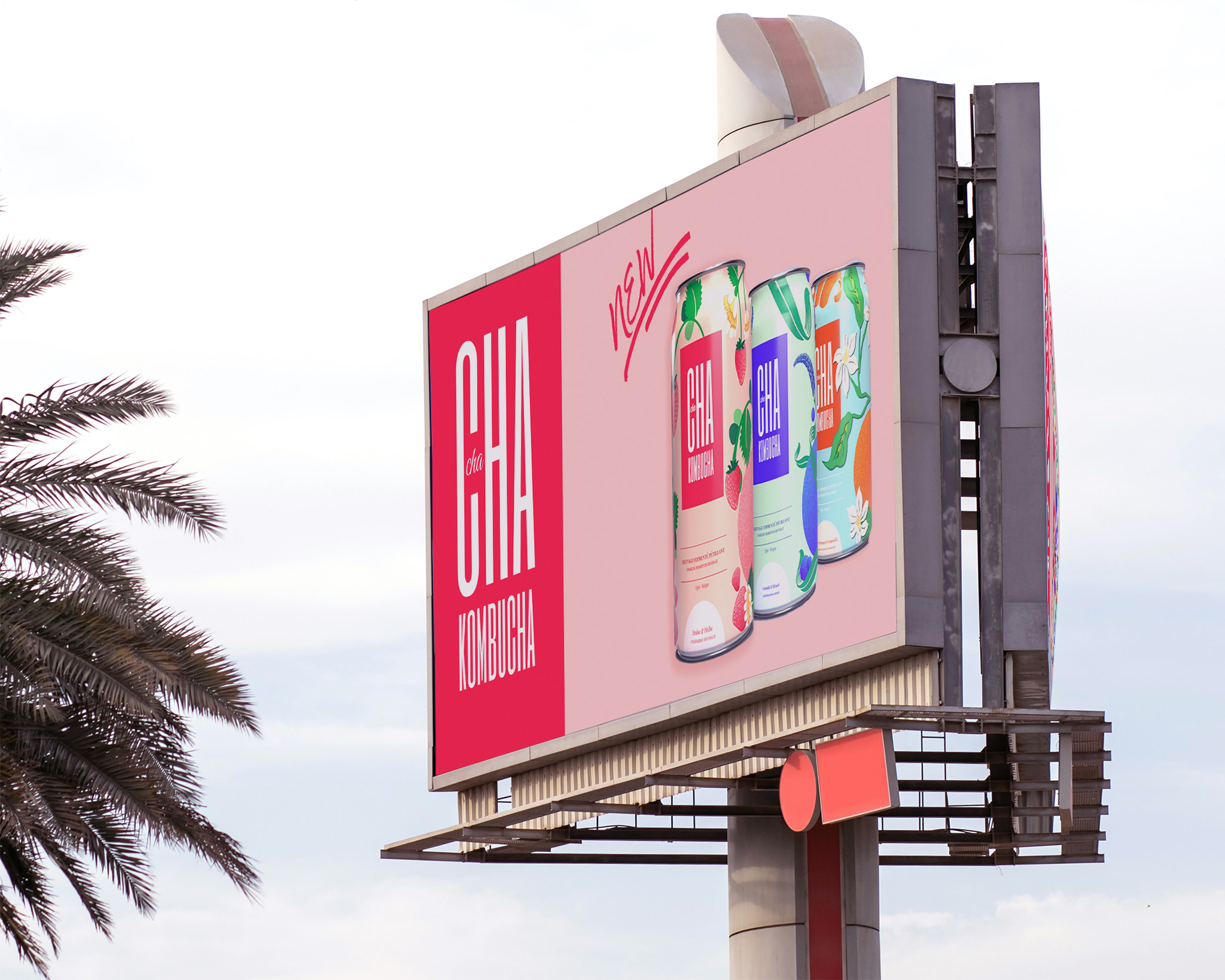 Kombucha advertisement pink them on a billboard in the sky with a palm tree on the left.