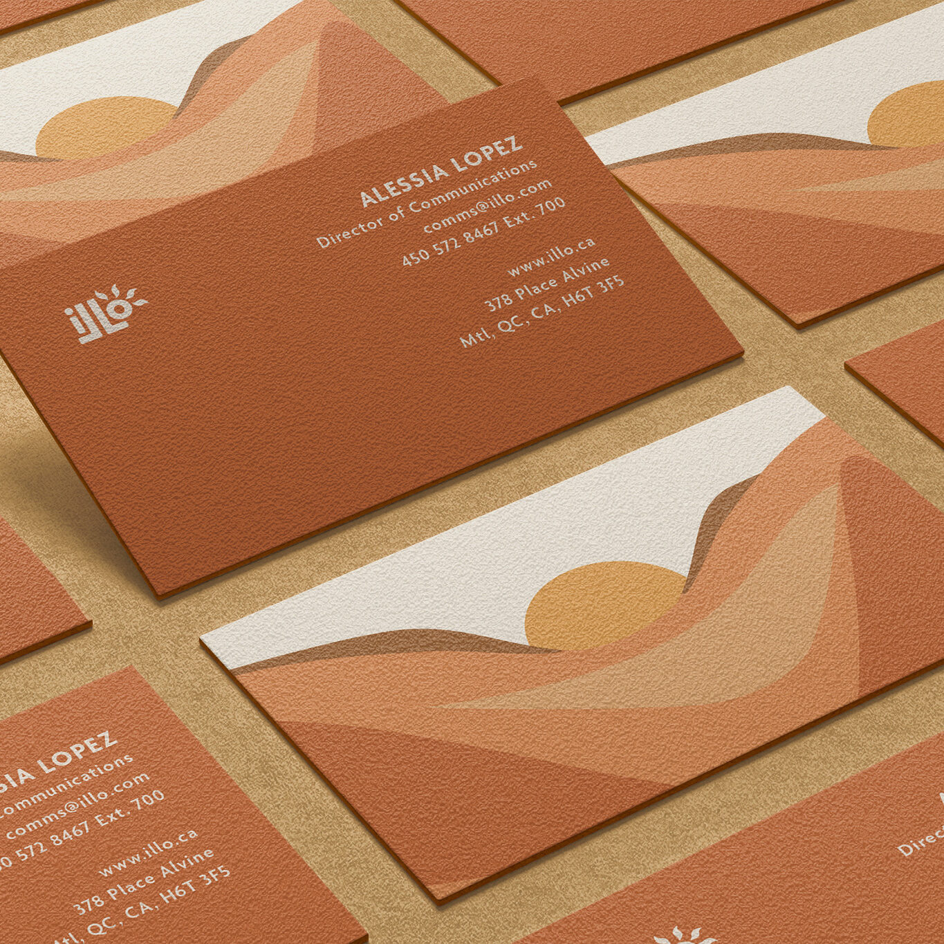 Business cards created for an imagined travel agency called illo adventures. These are the desert themed orange ones with an illustrated landscape of the desert on the back.