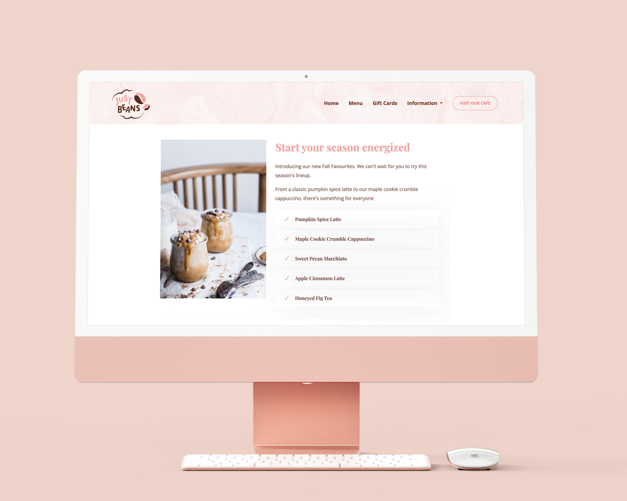 Just Beans Cafe mockup on a pink compute with a pink theme website feature coffee and baked treats. 