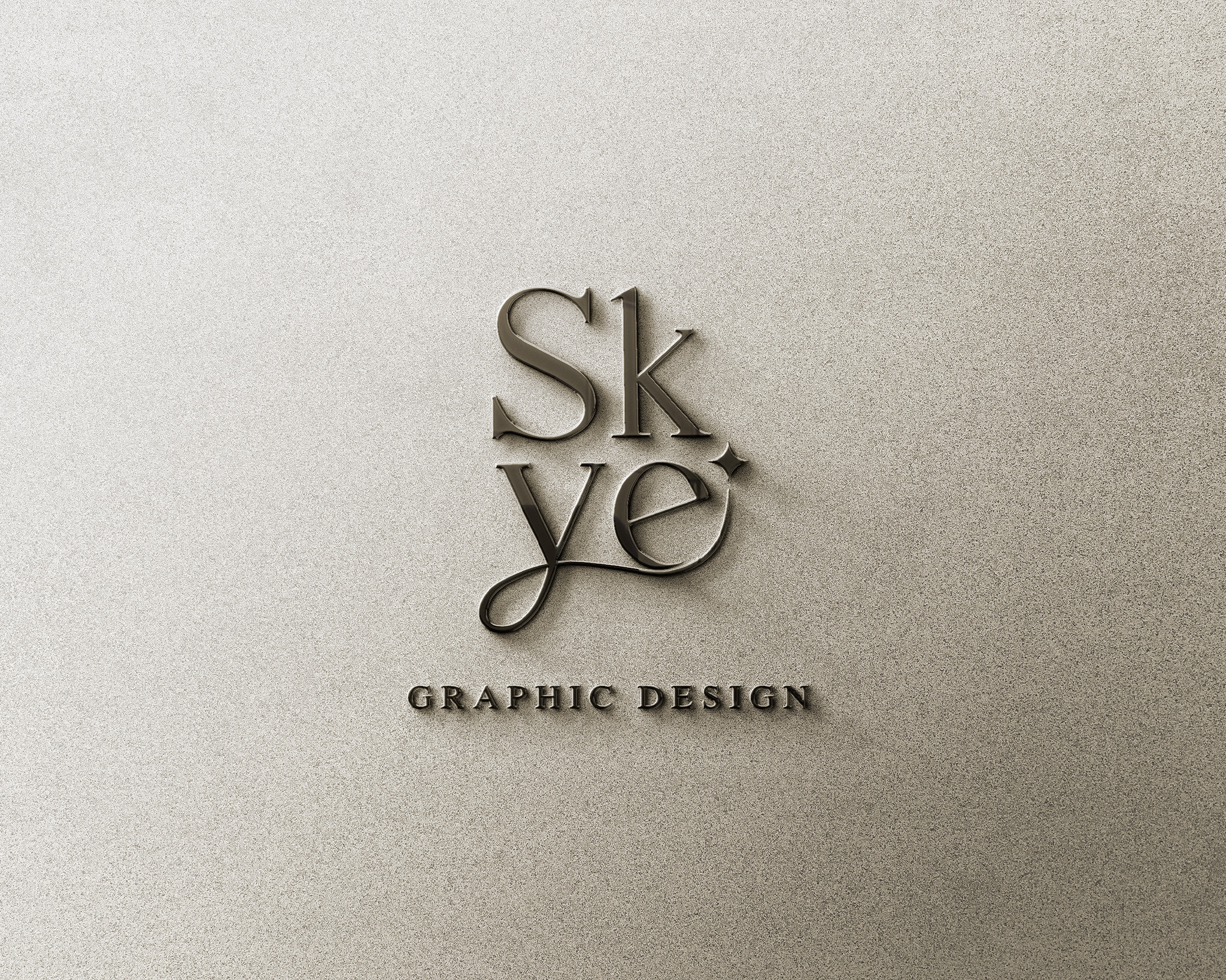 Redesigned logo and tagline of Skye Designs. It is place on a wall and made to look like a metal sign/decor.