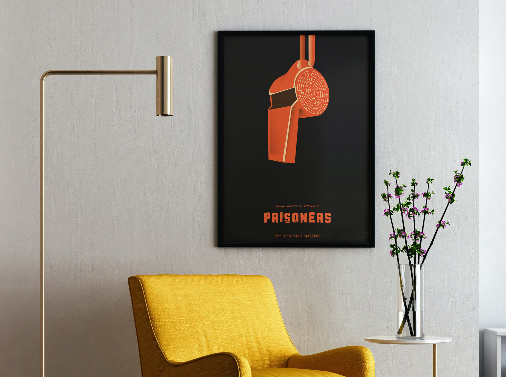 The minimalist illustrated movie poster for Prisoners. It features a red whistle on a black background. It is hung on the wall in a living room alongside a yellow chair.